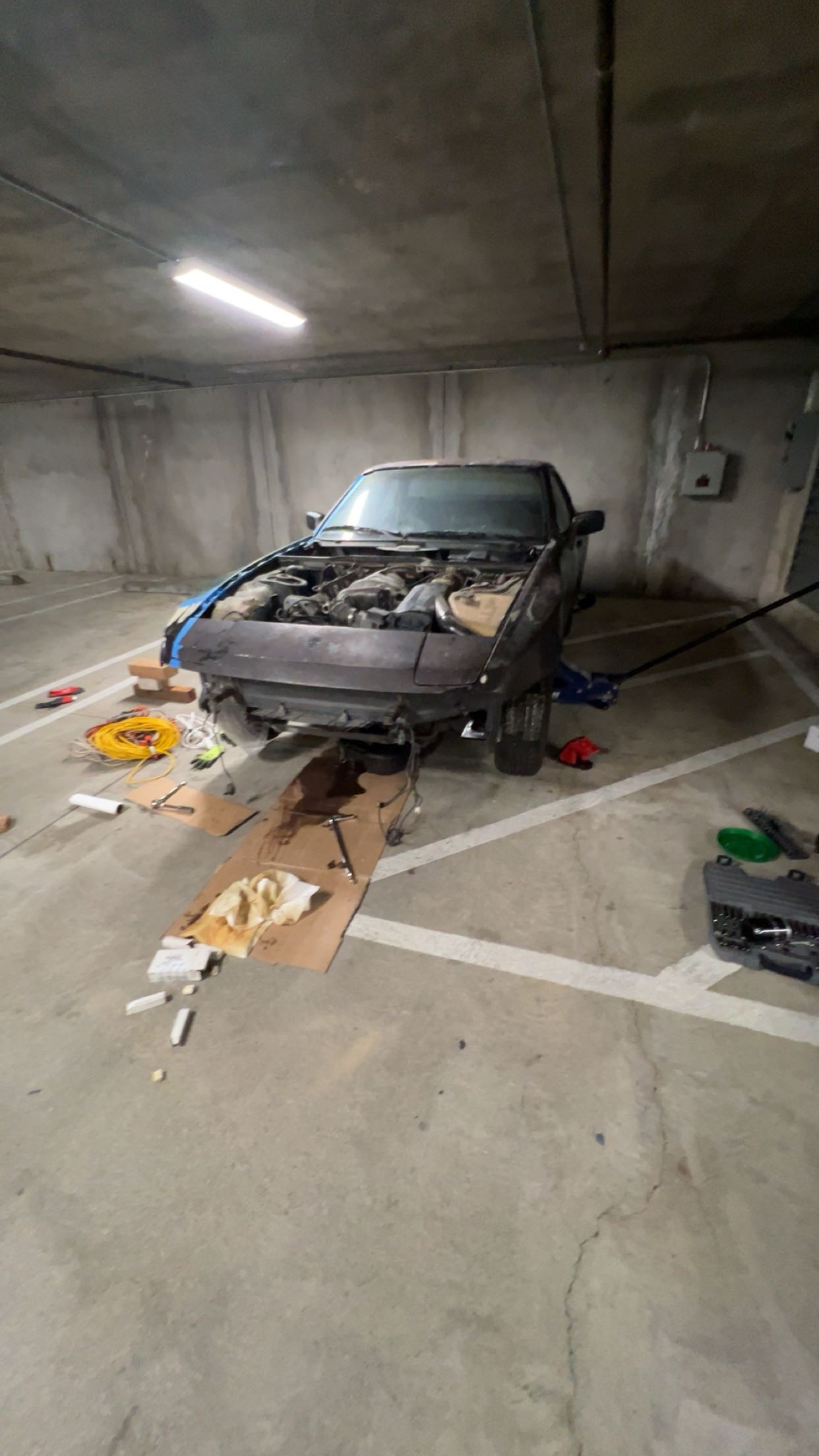 1983 Porsche 944 being worked on
